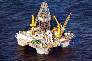 GULF OF MEXICO - MAY 09: A drilling platform is seen near the site where the Deepwater Horizon oil platform sank as work continues to contain the oil leak on May 9, 2010 in the Gulf of Mexico. The Deepwater Horizon oil rig operated by BP is leaking an estimated 5,000 barrels of oil a day into the Gulf and the slick has now reached nearby land. Efforts to contain the spill, including a 98-ton containment box to cap the leak, have done little to slow its flow. (Photo by Joe Raedle/Getty Images)
